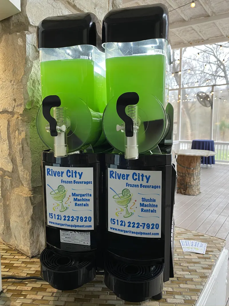 Lime margarita machine on a covered patio