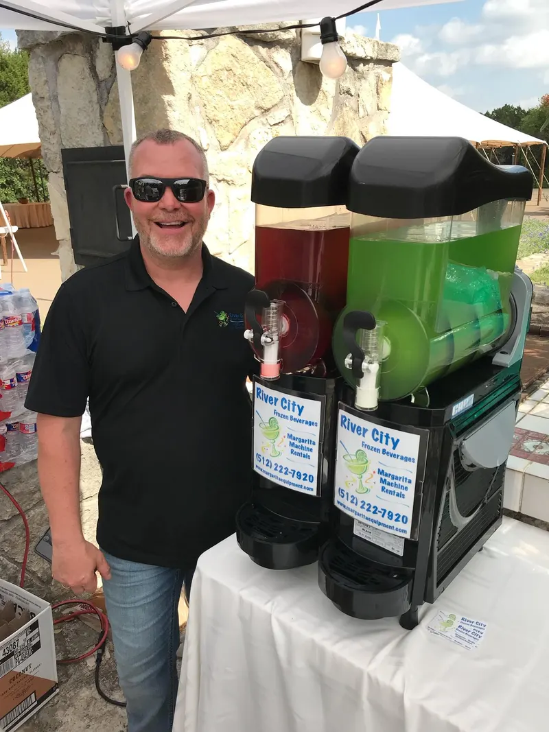 Steve from River City with a margarita machine at an outdoor event