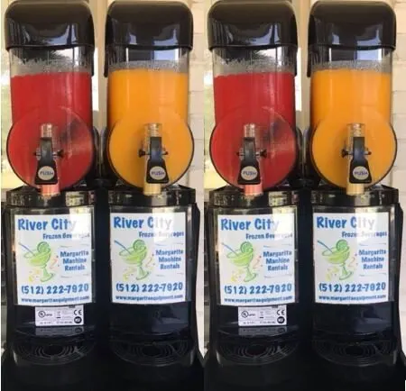 Two margarita machines with four flavors